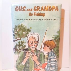 Gus and GRANDPA Go Fishing  by Claudia Mills Pre-owned  acceptable condition.